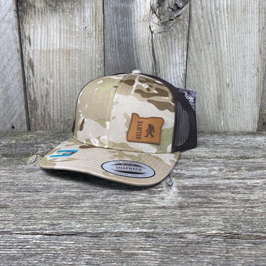 BIGFOOT OREGON LEATHER PATCH HAT FLEXFIT Leather Patch Hats Hells Canyon Designs Arid/Brown Multicam