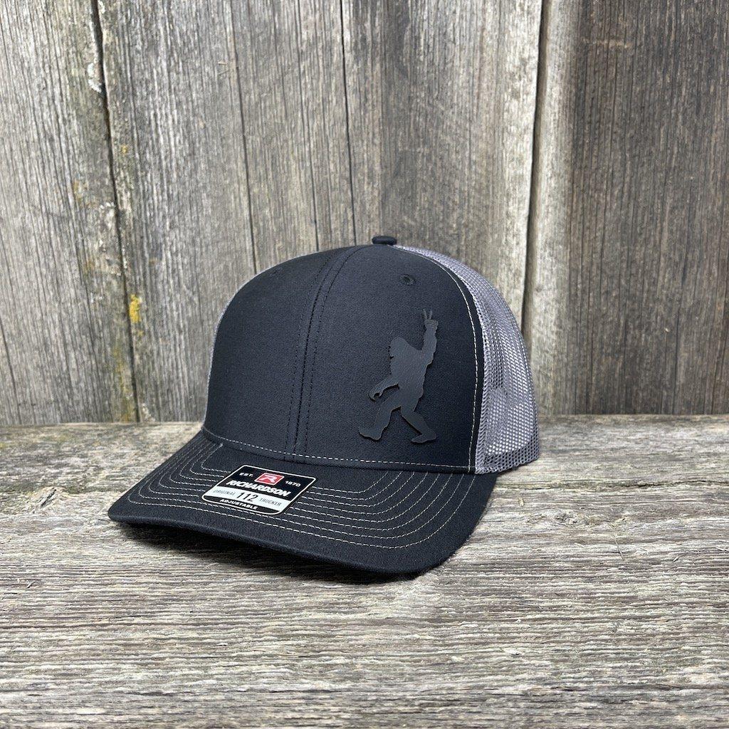 BIGFOOT PEACE SIGN BLACK LEATHER PATCH HAT - RICHARDSON 112 Leather Patch Hats Hells Canyon Designs # Black/Charcoal