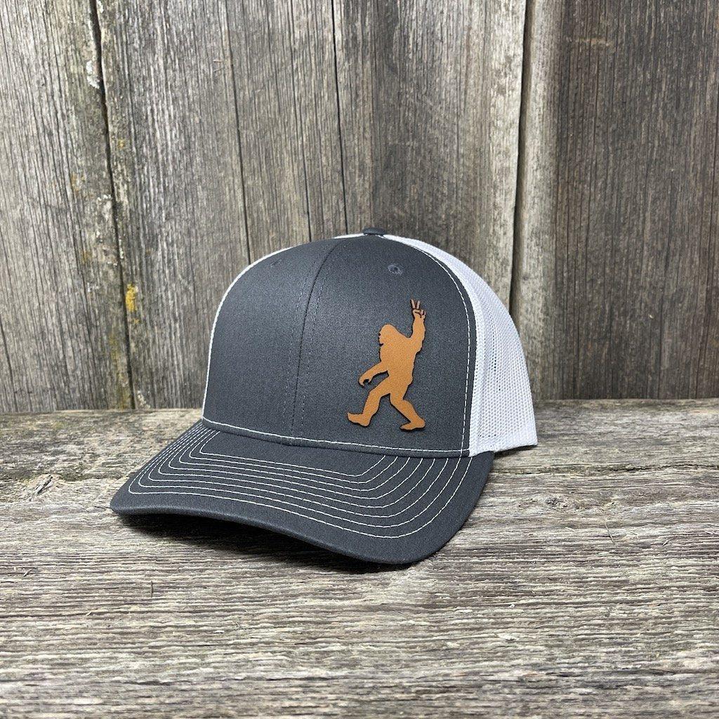 BIGFOOT PEACE SIGN CHESTNUT LEATHER PATCH HAT - RICHARDSON 112 Leather Patch Hats Hells Canyon Designs # Charcoal/White
