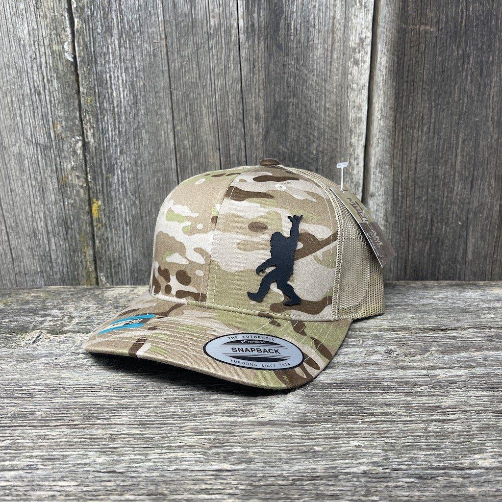 SASQUATCH BLACK LEATHER SHAKA PATCH - FLEXFIT-SNAPBACK Leather Patch Hats Hells Canyon Designs #Arid/Tan Multi-cam