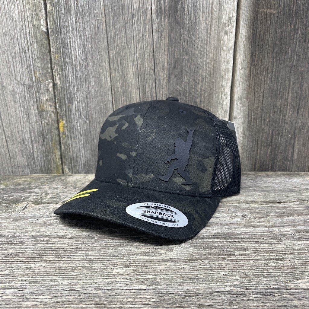 SASQUATCH BLACK LEATHER SHAKA PATCH - FLEXFIT-SNAPBACK Leather Patch Hats Hells Canyon Designs # Black Multi-cam